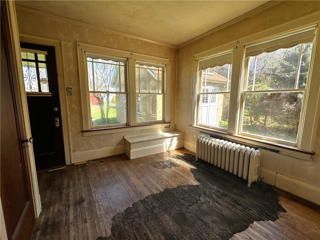 919 Oak Street Indiana, PA 15701 - Photo 11 of 27 a view of an empty room with wooden floor and a window