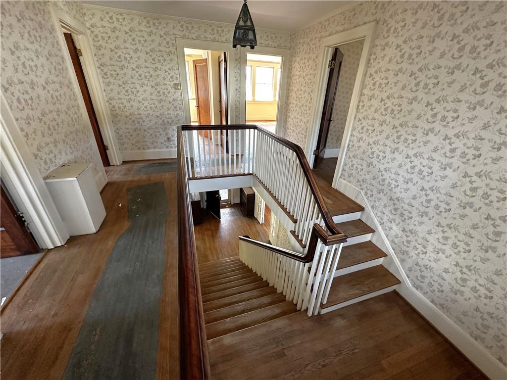 919 Oak Street Indiana, PA 15701 - Photo 12 of 27 a view of staircase with wooden floor and white walls