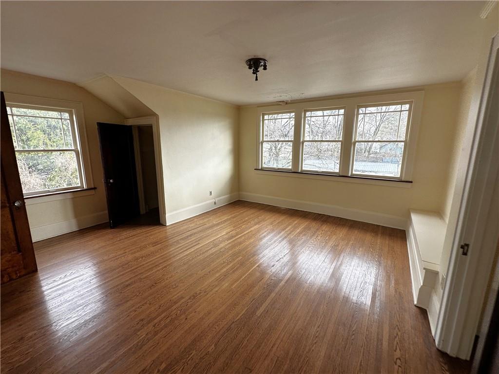 919 Oak Street Indiana, PA 15701 - Photo 15 of 27 a view of an empty room with wooden floor and a window