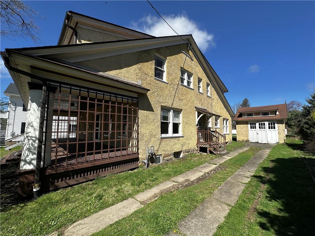 919 Oak Street Indiana, PA 15701 - Photo 24 of 27 a front view of a house with a garden