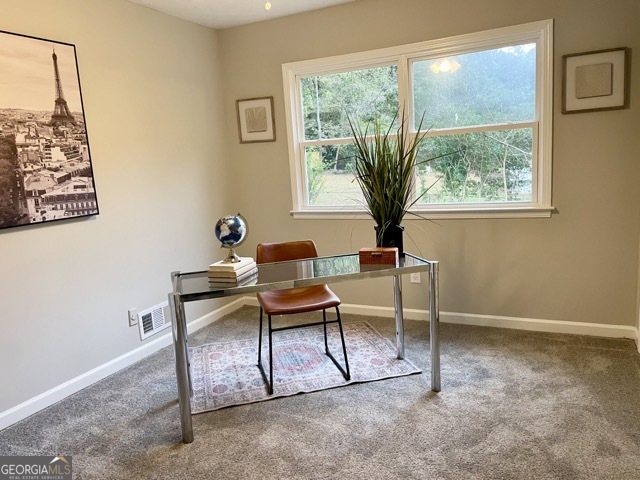 5058 Rock Springs Road Lithonia, GA 30038 - Photo 14 of 28 a work room with furniture and a window