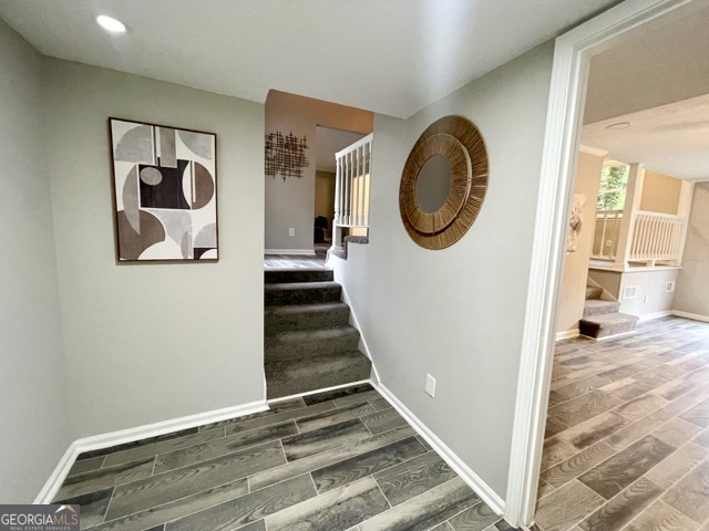 5058 Rock Springs Road Lithonia, GA 30038 - Photo 8 of 28 a view of a hallway with wooden floor and entryway