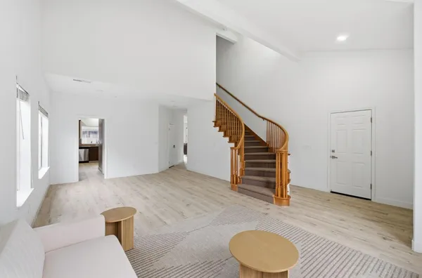a view of livingroom with hardwood and furniture