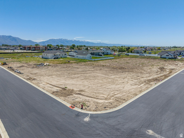 3150 South 5250 West, Unit 210 Hooper, UT 84315 - Photo 7 of 11 Expansive corner lot featuring a level, cleared building site