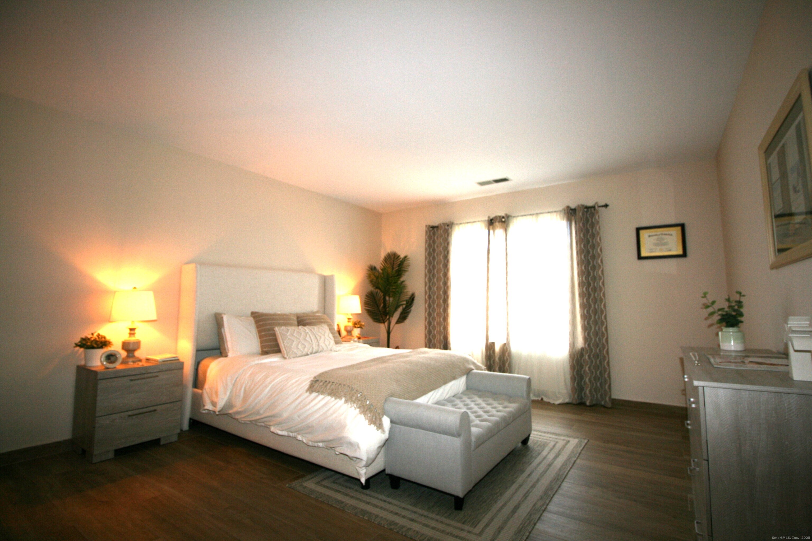 7 Twin Oak Court, Unit 7 Avon, CT 06001 - Photo 13 of 32 a bedroom with a bed and a window