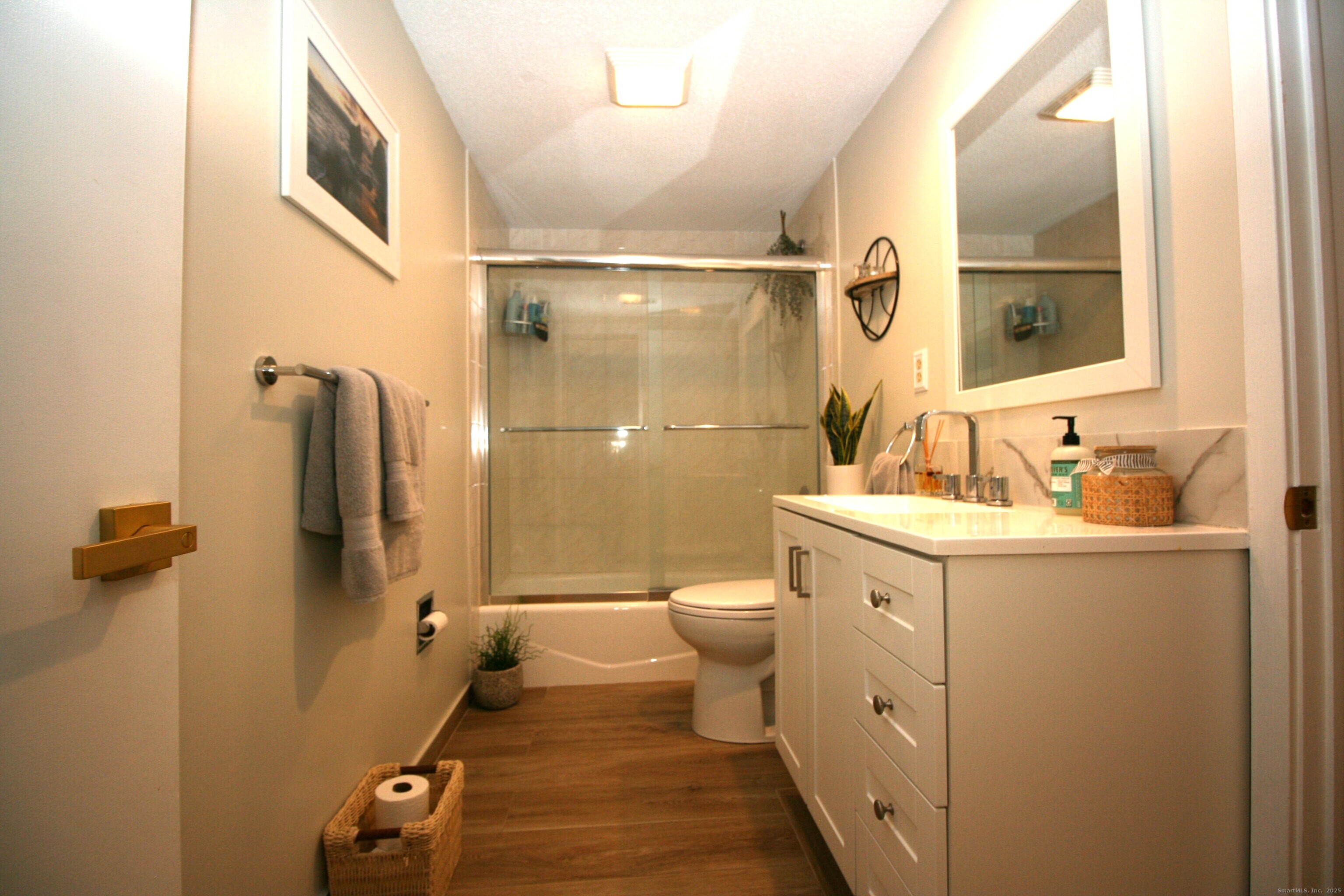 7 Twin Oak Court, Unit 7 Avon, CT 06001 - Photo 18 of 32 a bathroom with a sink toilet and shower