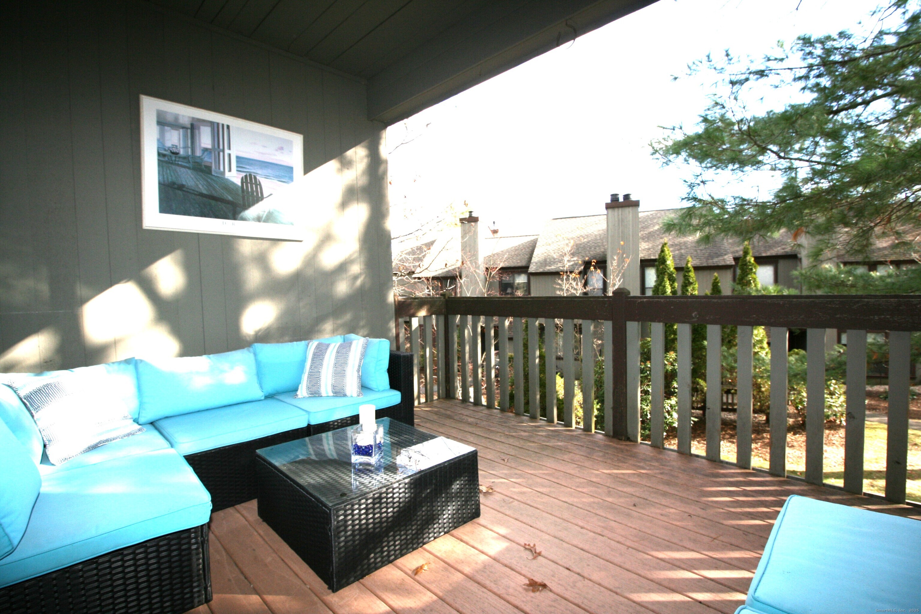 7 Twin Oak Court, Unit 7 Avon, CT 06001 - Photo 21 of 32 a living room with furniture and a large window
