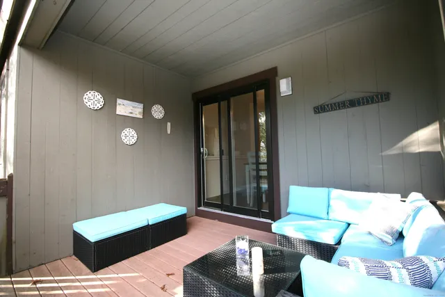 a balcony view with a couch