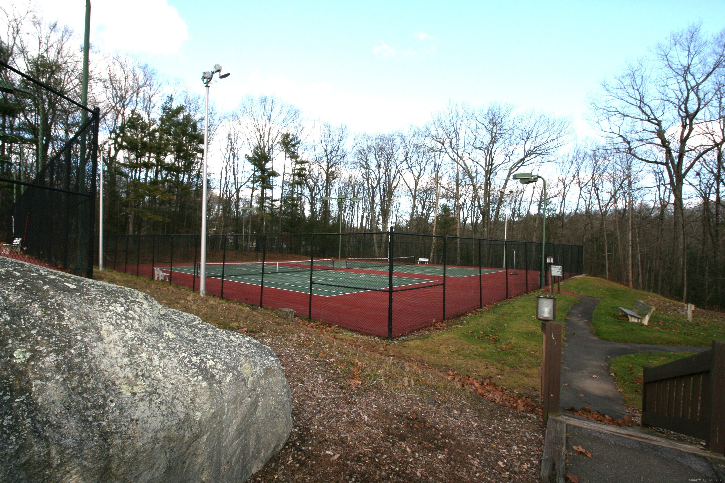 7 Twin Oak Court, Unit 7 Avon, CT 06001 - Photo 30 of 32 a view of a park with large trees
