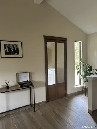 a view of an empty room and window