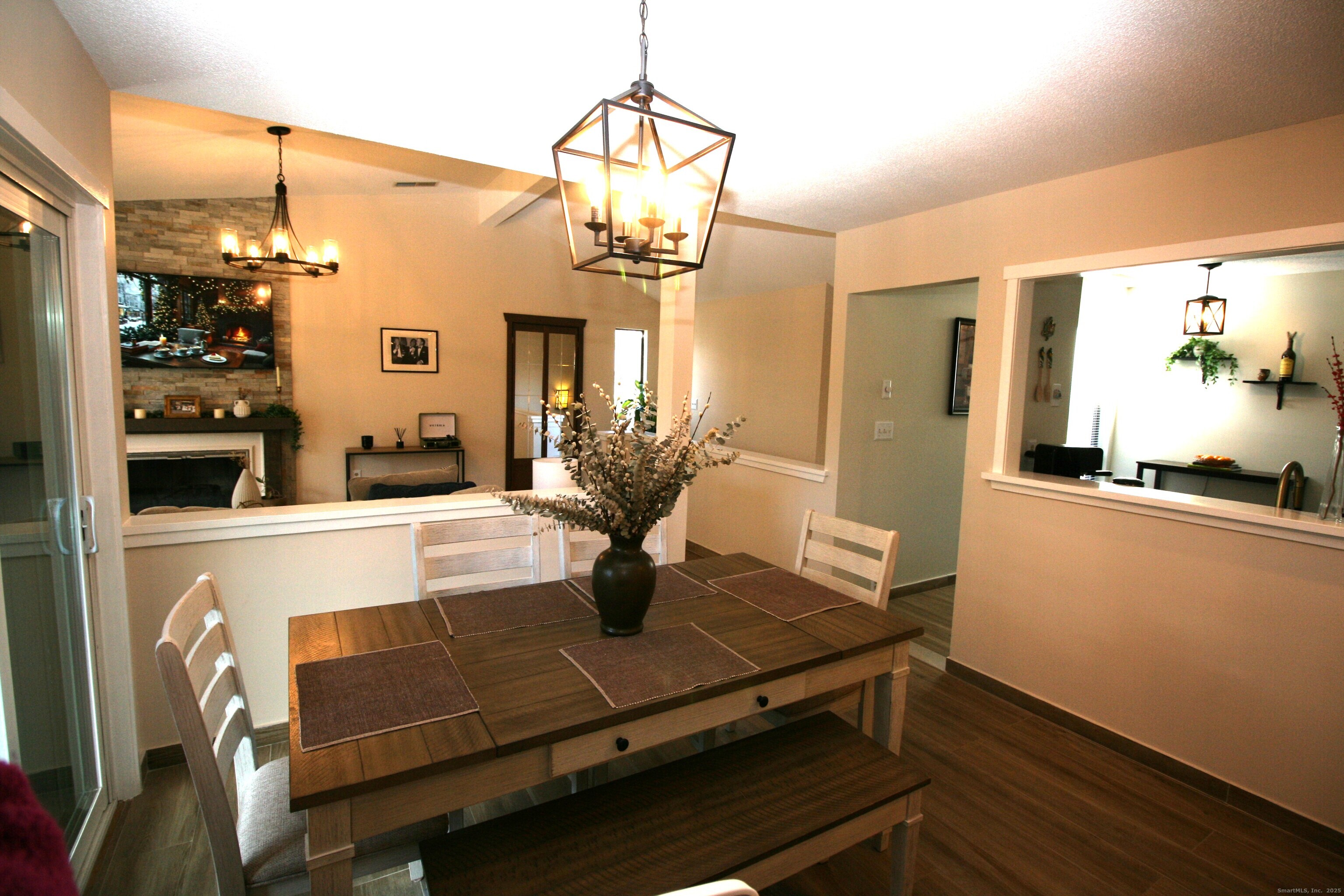7 Twin Oak Court, Unit 7 Avon, CT 06001 - Photo 8 of 32 a view of dining room with furniture and wooden floor