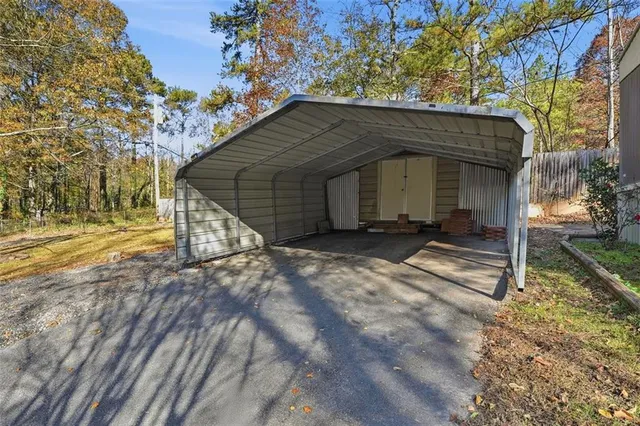 a house with trees in the background