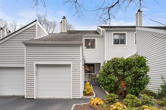 a view of a house with a garage