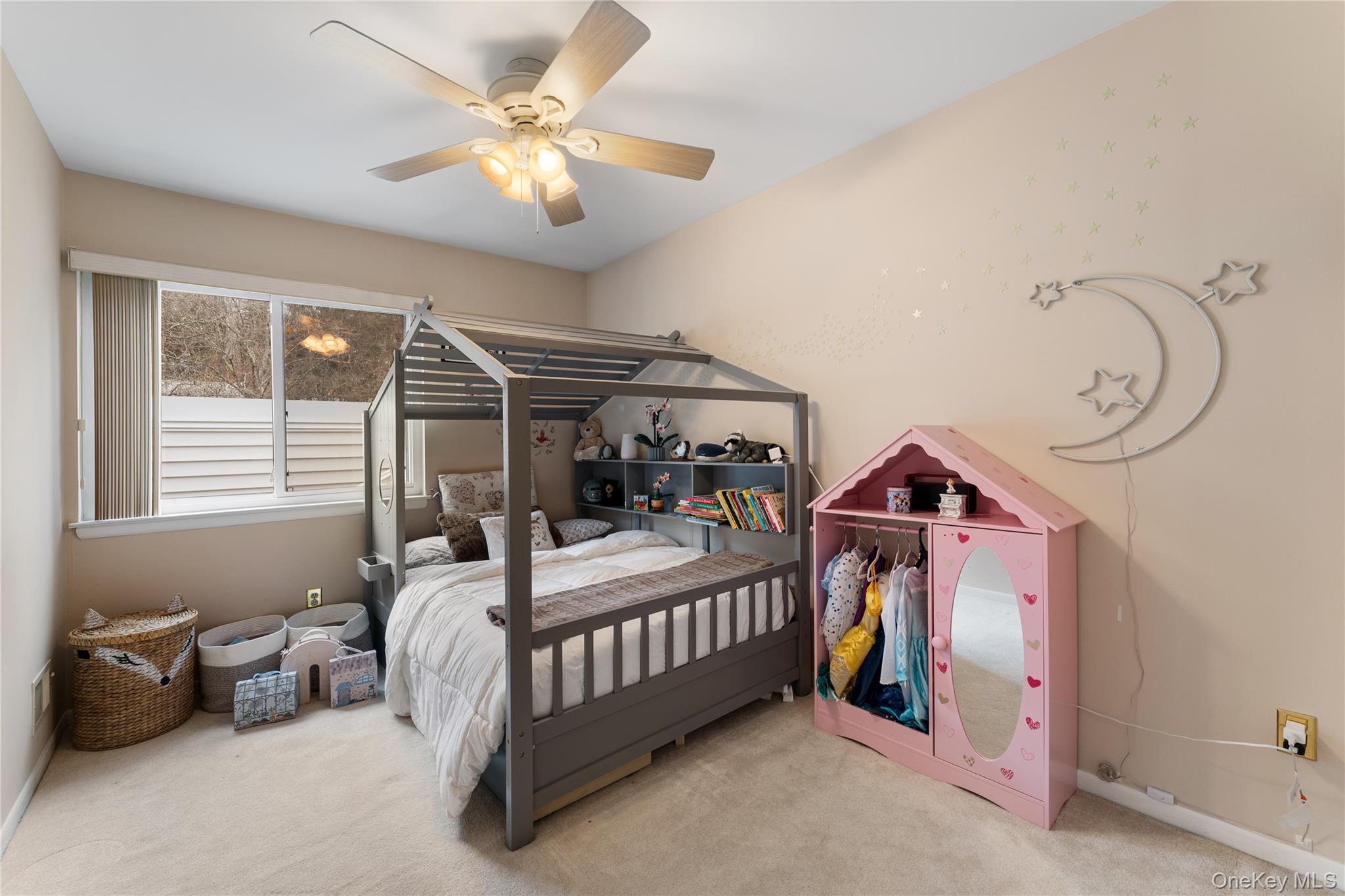 17 Ledgewood Commons Millwood, NY 10546 - Photo 11 of 22 a bedroom with furniture and a chandelier fan