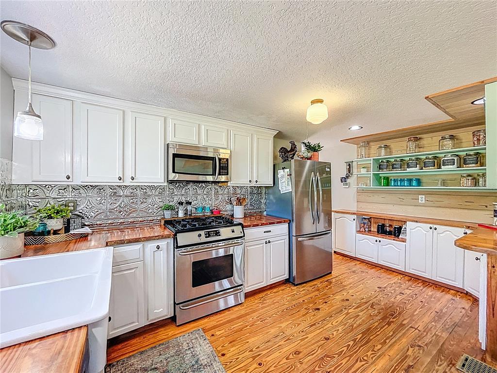 5870 Jim Davis Road Parrish, FL 34219 - Photo 15 of 39 Gas stove and modern appliances.