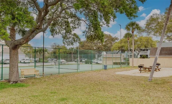a view of a park with swings and slides