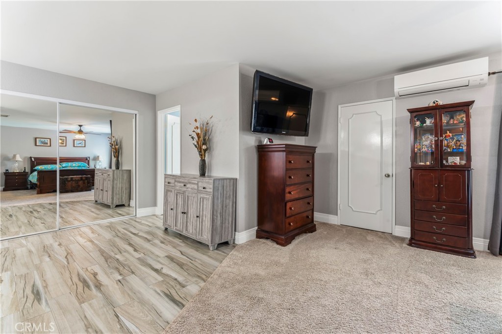 5739 Indigo Avenue Rancho Cucamonga, CA 91701 - Photo 20 of 51 Primary Bedroom- Walk-in and Addition Closet with Mirrored Wardrobe Doors