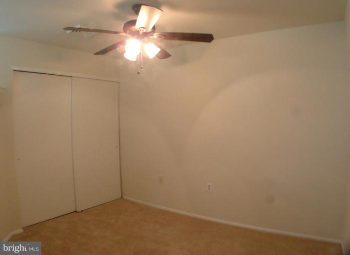 7024 Basswood Road Frederick, MD 21703 - Photo 11 of 12 a view of a small space with a fan and a window