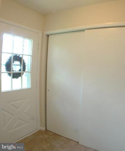 7024 Basswood Road Frederick, MD 21703 - Photo 6 of 12 a view of a window in an empty room