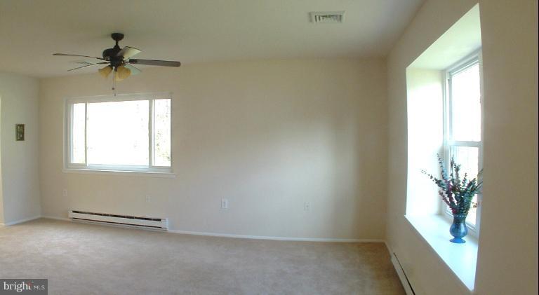 7024 Basswood Road Frederick, MD 21703 - Photo 10 of 12 an empty room with a window