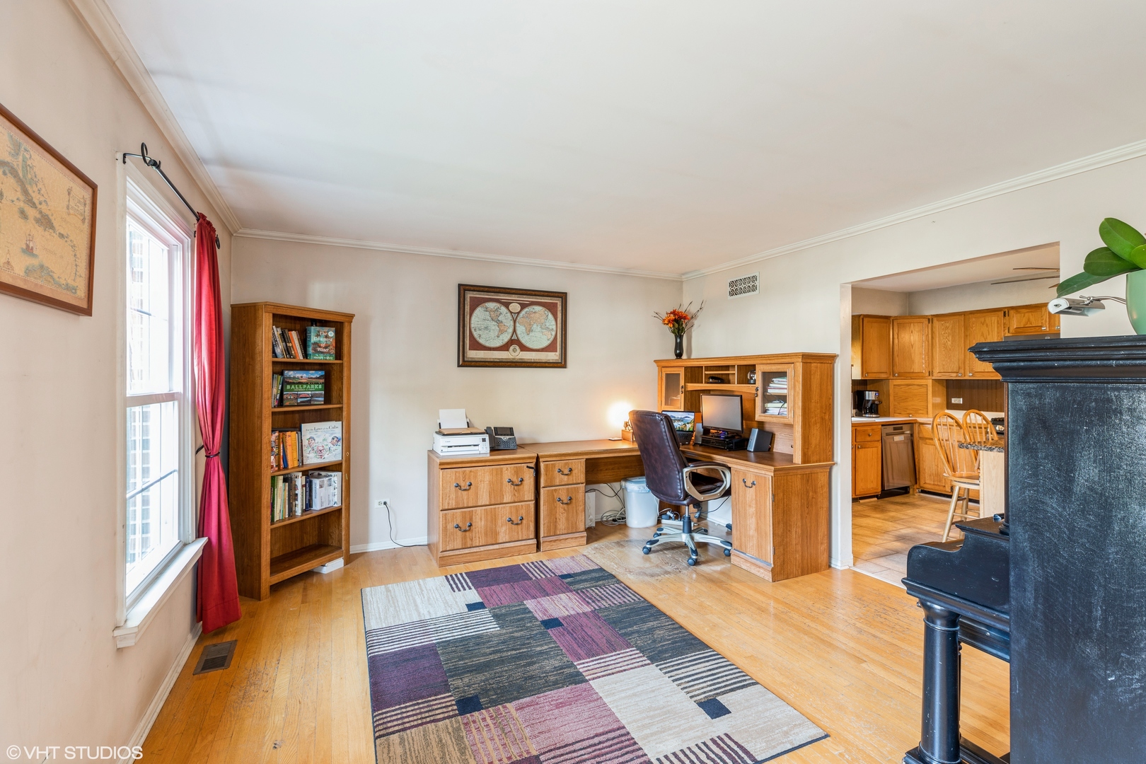 1707 Pine Road Homewood, IL 60430 - Photo 2 of 22 a view of a livingroom with furniture and a flat screen tv