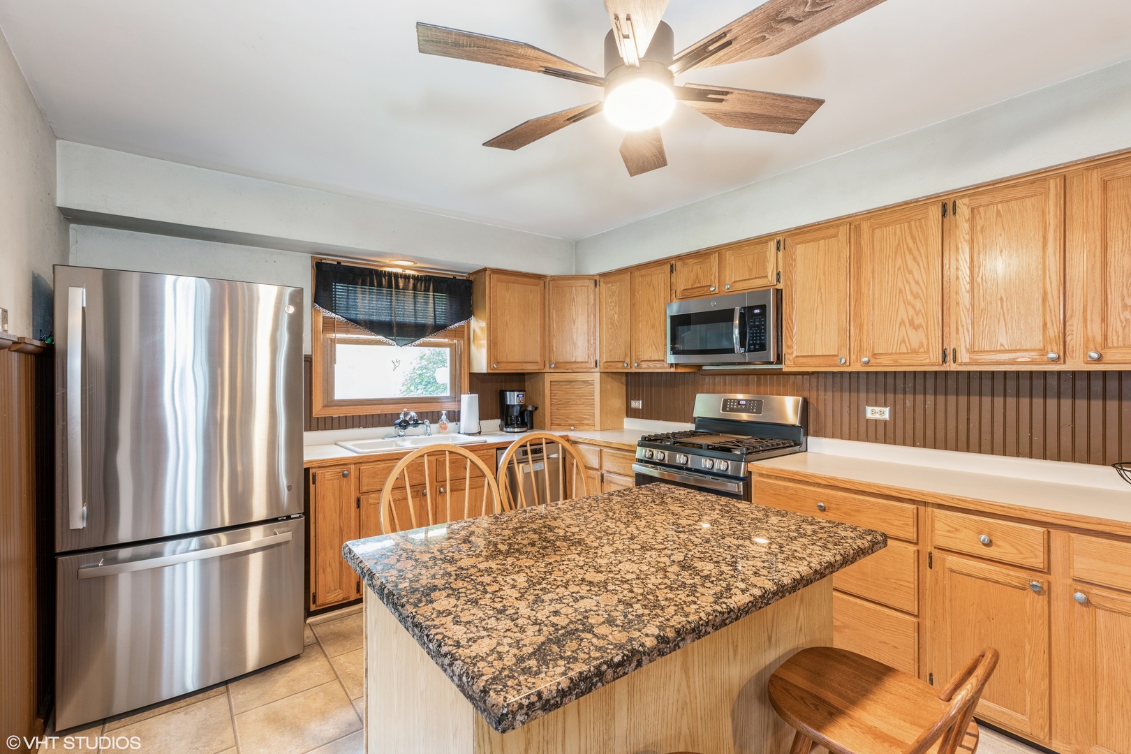 1707 Pine Road Homewood, IL 60430 - Photo 3 of 22 a kitchen with stainless steel appliances granite countertop a refrigerator stove top oven and sink