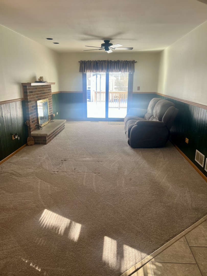 1707 Pine Road Homewood, IL 60430 - Photo 7 of 22 a living room with furniture and a window