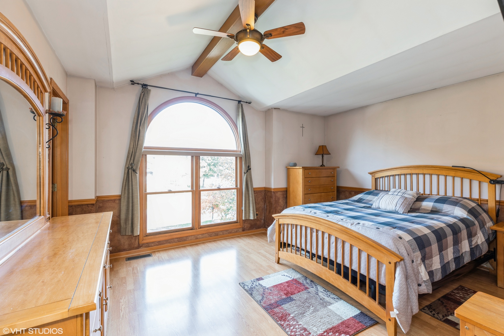 1707 Pine Road Homewood, IL 60430 - Photo 9 of 22 a bedroom with a bed a chandelier and a window