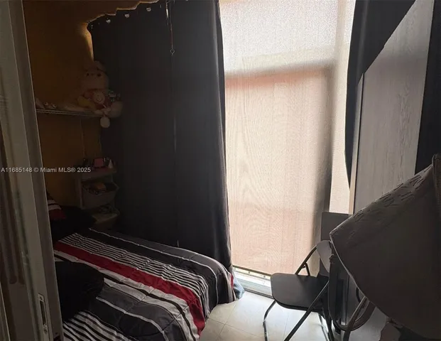 a bedroom with a bed