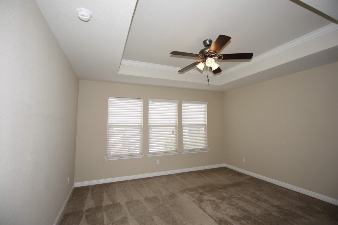 3804 Kennedy Grace Lane Austin, TX 78728 - Photo 12 of 21 a view of an empty room with a window