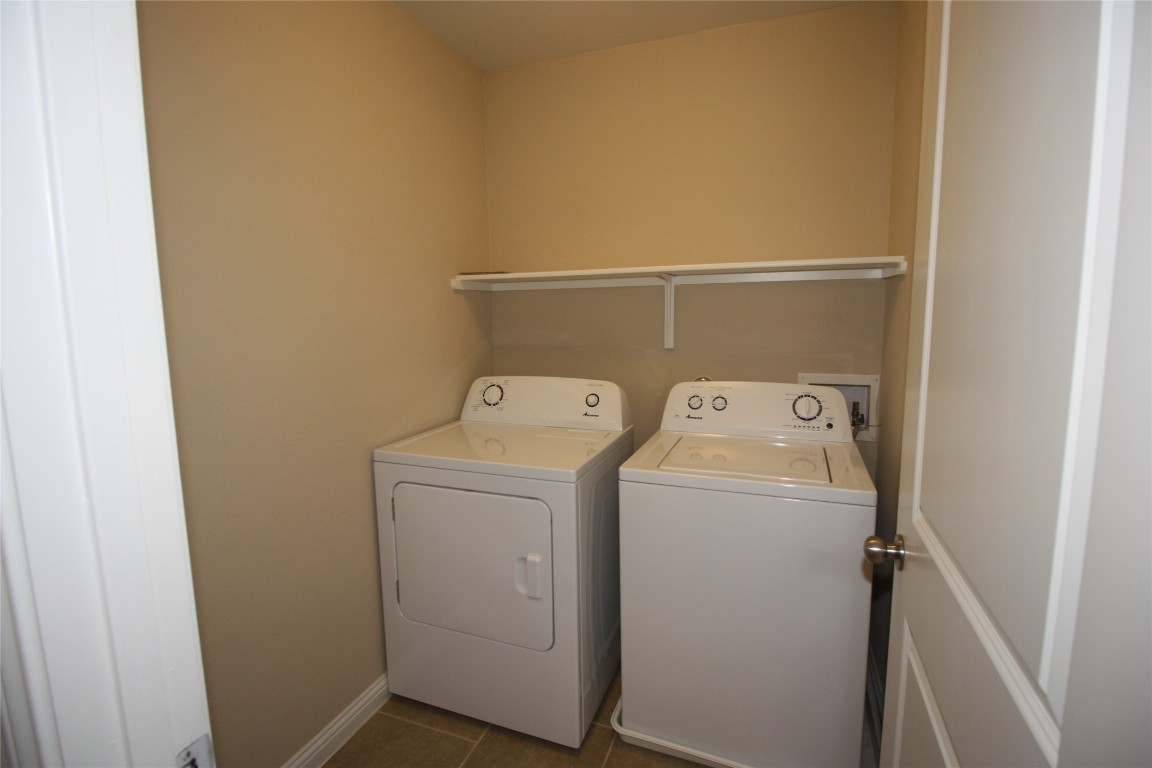 3804 Kennedy Grace Lane Austin, TX 78728 - Photo 18 of 21 a utility room with dryer and washer