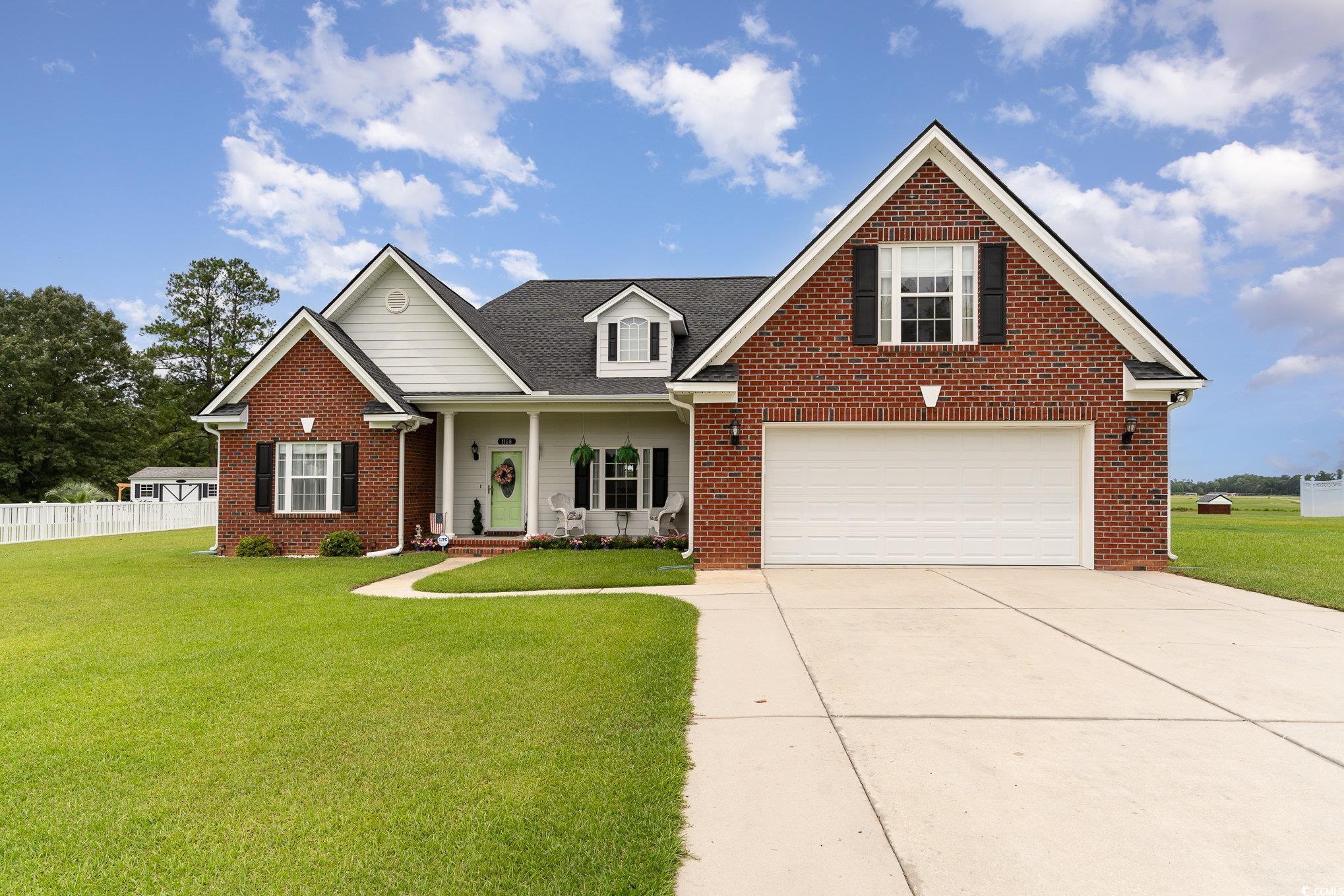 1168 Floyd Page Road Galivants Ferry, SC 29544 - Photo 1 of 37 View of front of home featuring a garage and a fro