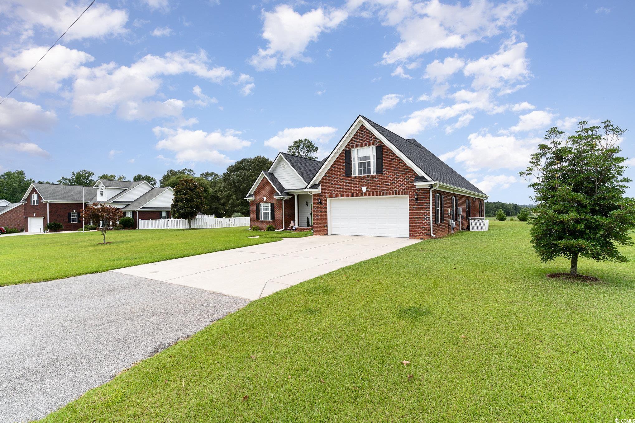 1168 Floyd Page Road Galivants Ferry, SC 29544 - Photo 2 of 37 View of front of home with a front yard