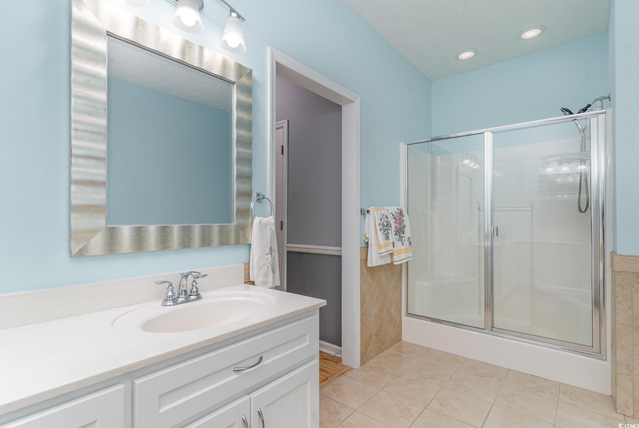 1168 Floyd Page Road Galivants Ferry, SC 29544 - Photo 21 of 37 Bathroom featuring large double vanities, jetted t
