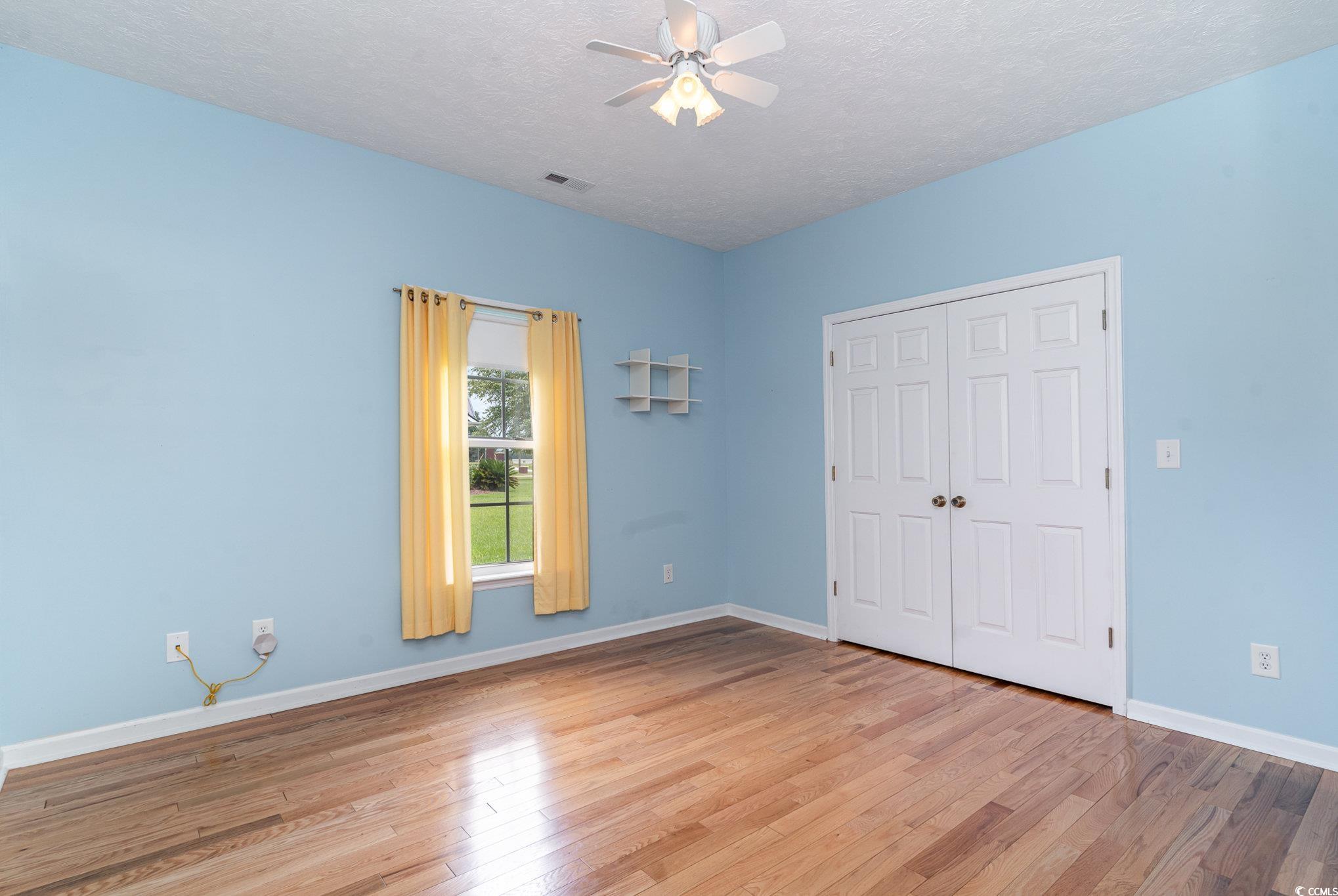 1168 Floyd Page Road Galivants Ferry, SC 29544 - Photo 25 of 37 Unfurnished bedroom featuring light hardwood / woo