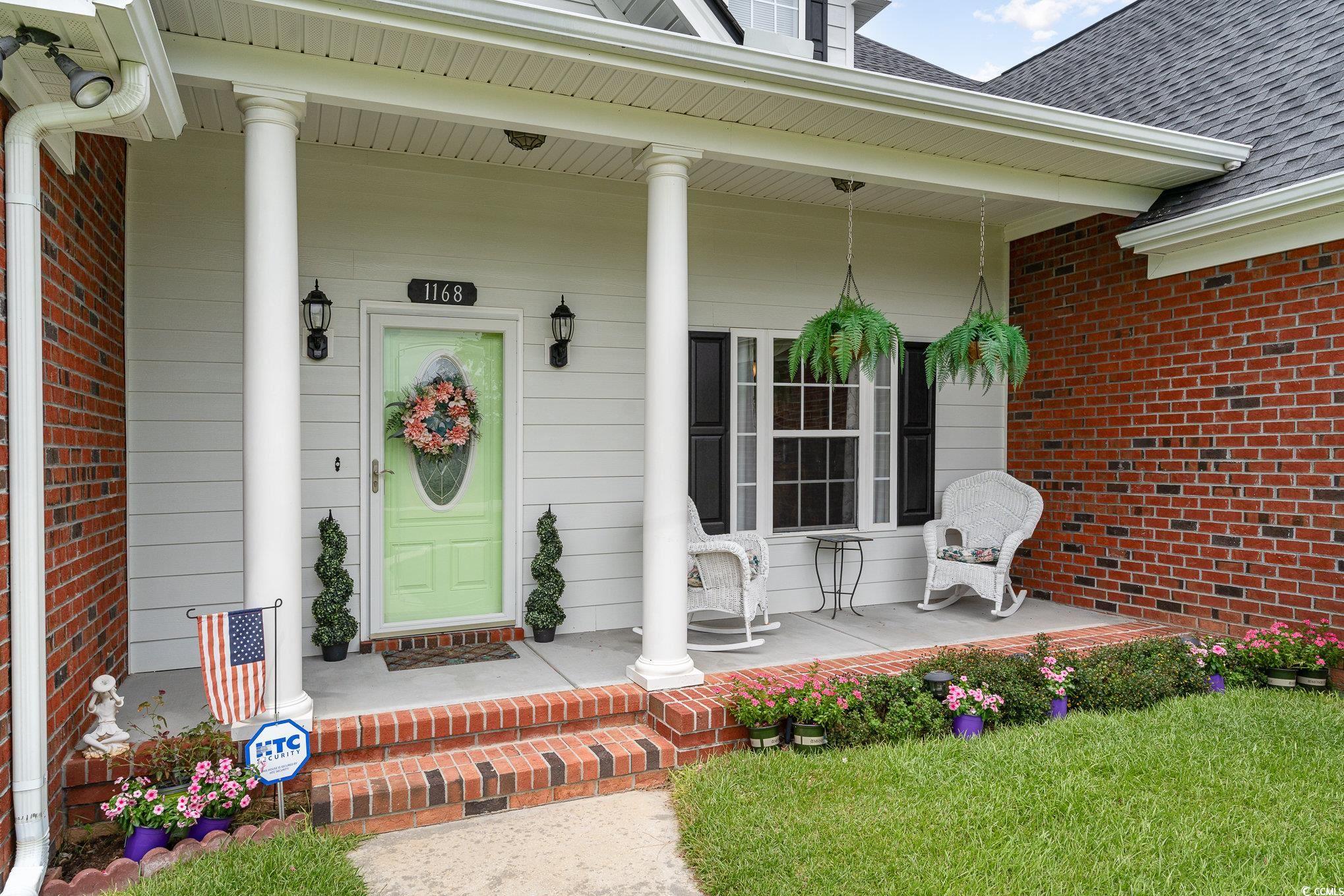 1168 Floyd Page Road Galivants Ferry, SC 29544 - Photo 3 of 37 Doorway to property with covered porch
