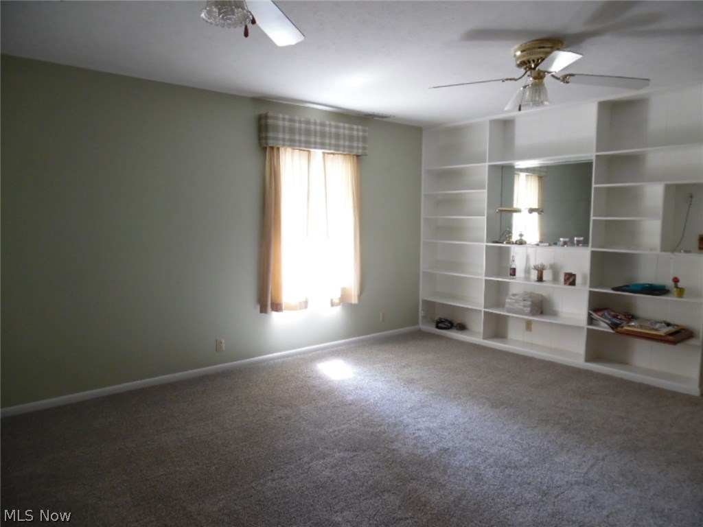3573 Braun Road Belpre, OH 45714 - Photo 18 of 29 Rec Room in Lower Level with Storage Shelves
