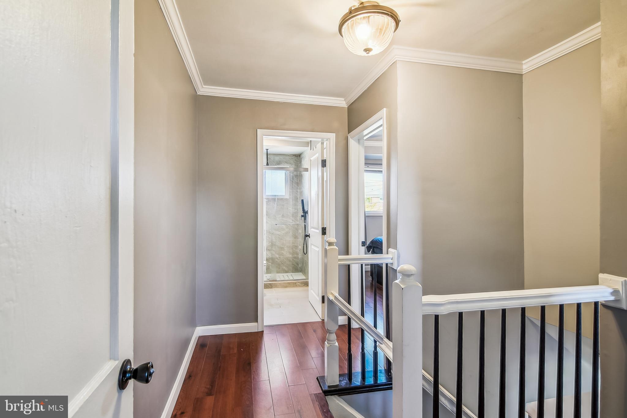 1921 Inverton Road Dundalk, MD 21222 - Photo 15 of 36 a view of a hallway with wooden floor and closet