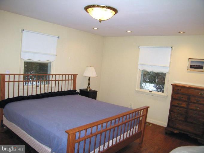 701 Gilmarys Road Baltimore, MD 21210 - Photo 14 of 23 a bedroom with a bed and a window