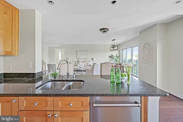 a spacious bedroom with a bed and a window
