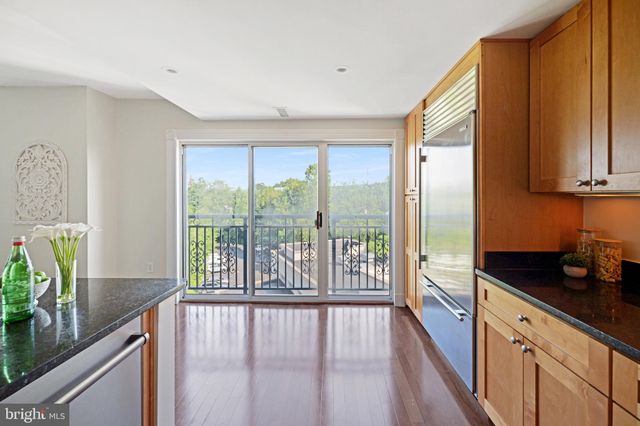 a bathroom with a shower and a bath tub