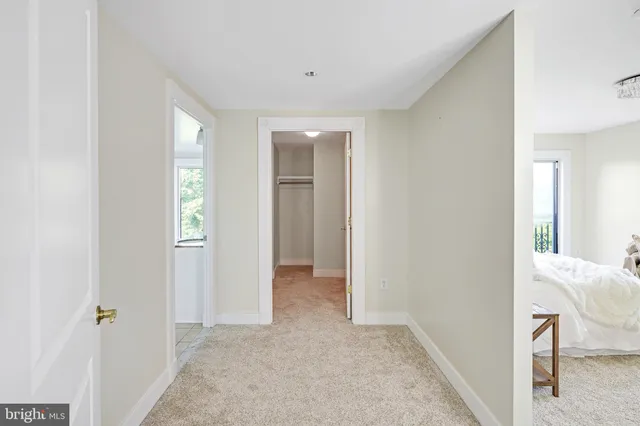 a bathroom with a shower and a bath tub