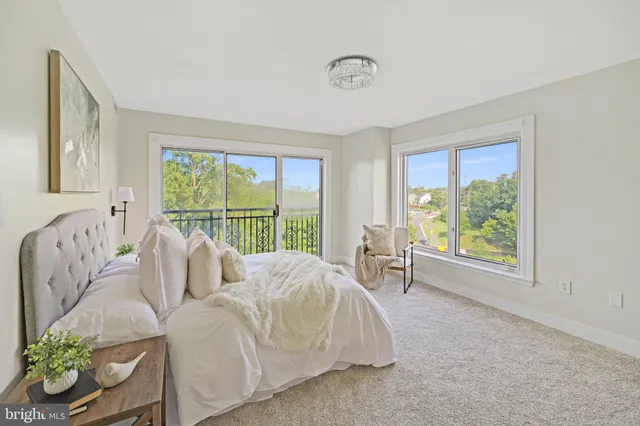 a spacious bathroom with a granite countertop tub sink and mirror