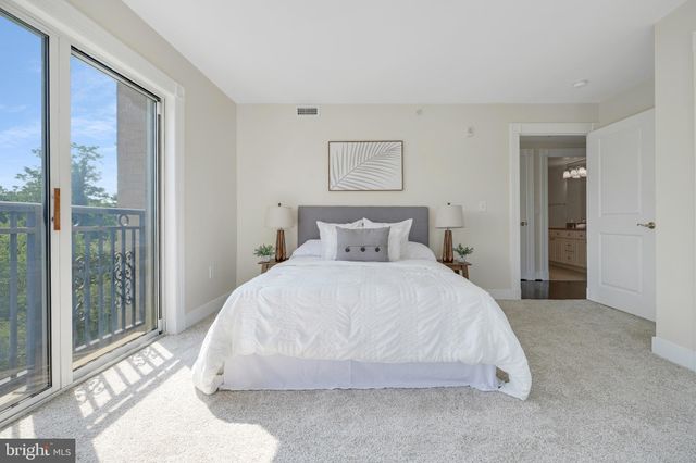 a view of a building with a swimming pool