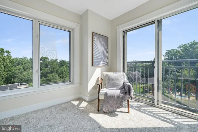 a view of a building with a swimming pool