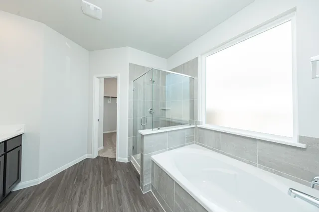 a view of kitchen with wooden floor