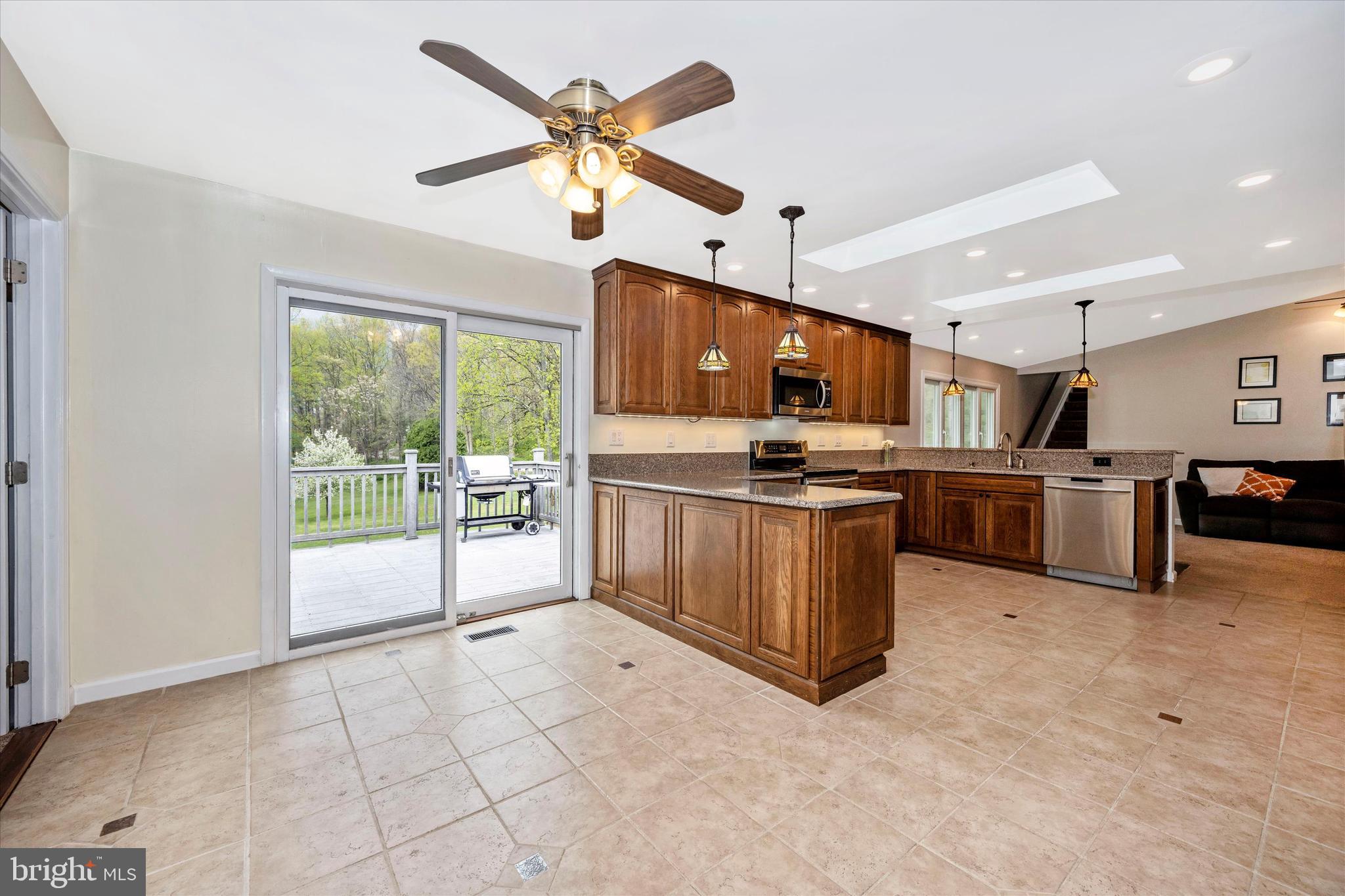 6345 Davis Road Mount Airy, MD 21771 - Photo 22 of 76 kitchen with sliders to large deck
