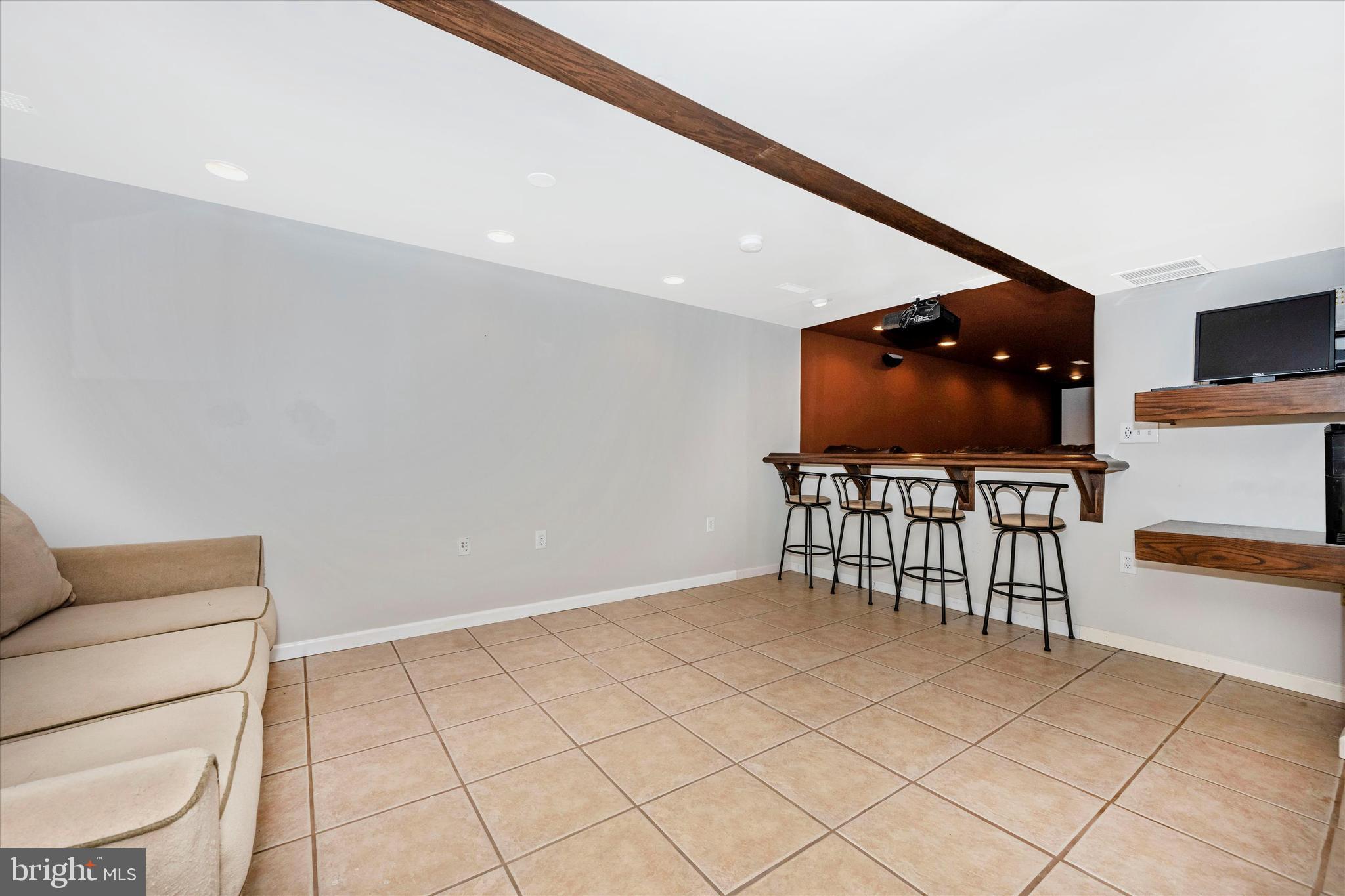 6345 Davis Road Mount Airy, MD 21771 - Photo 44 of 76 second LL entertaining area with bar