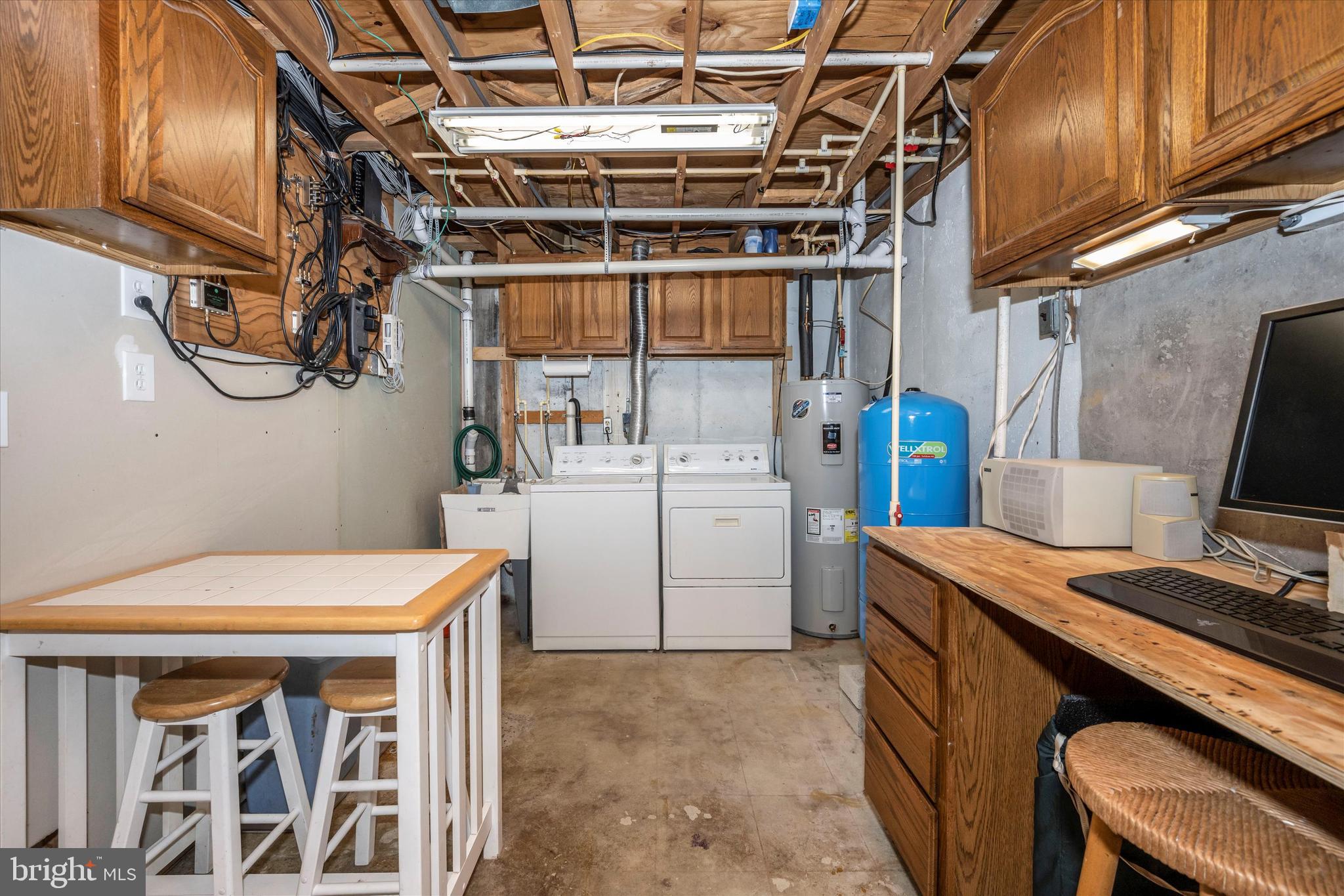 6345 Davis Road Mount Airy, MD 21771 - Photo 46 of 76 laundry area with storage
