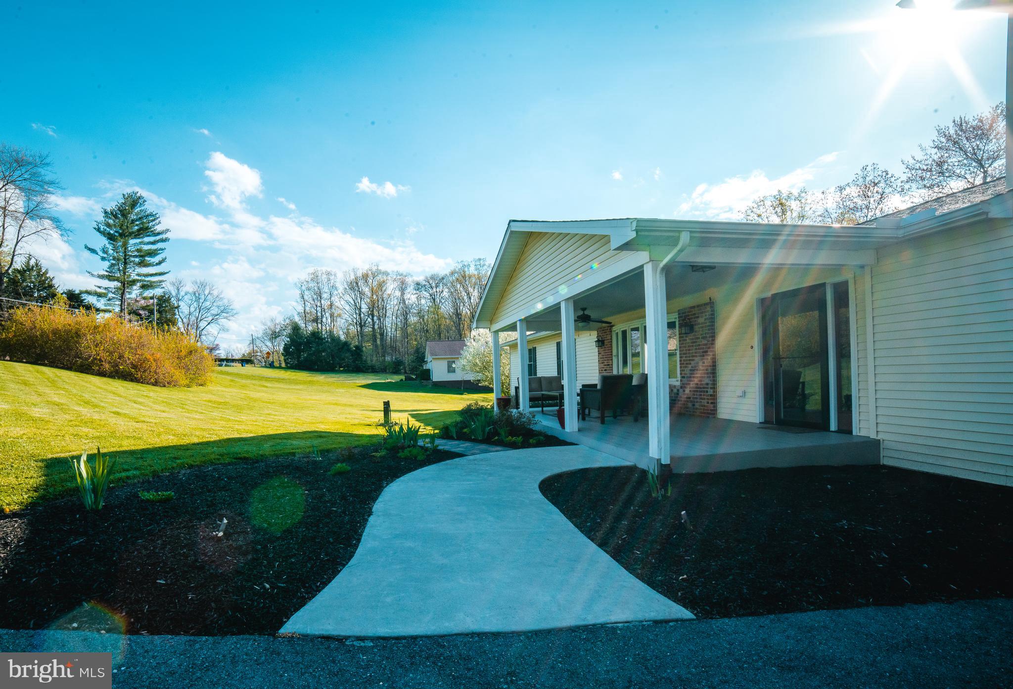 6345 Davis Road Mount Airy, MD 21771 - Photo 6 of 76 covered front porch and walkway from drive